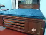New queen size coat and spring type bed
