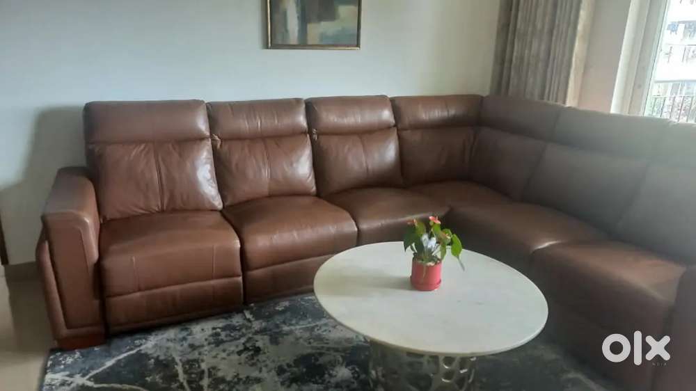 7 Seater RESTLY leather sofa with 2 fitted Recliners