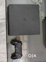 Ps4 slim with 2 controllers and all cables - good condition
