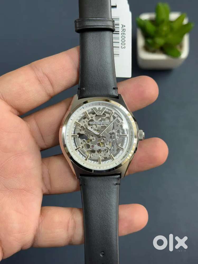 Emporio Armani 
Men Skeleton Dial Automatic
Motion Powered Watch