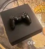 PS4 slim 500gb with 2 game cds and one joystick