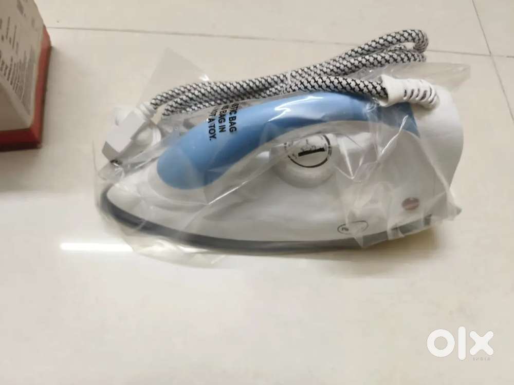 Iron press pigeon company unused with warranty