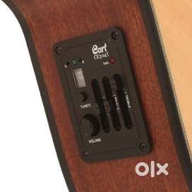 Classical Cutaway Guitar - Electro Acoustic. Make : Cort