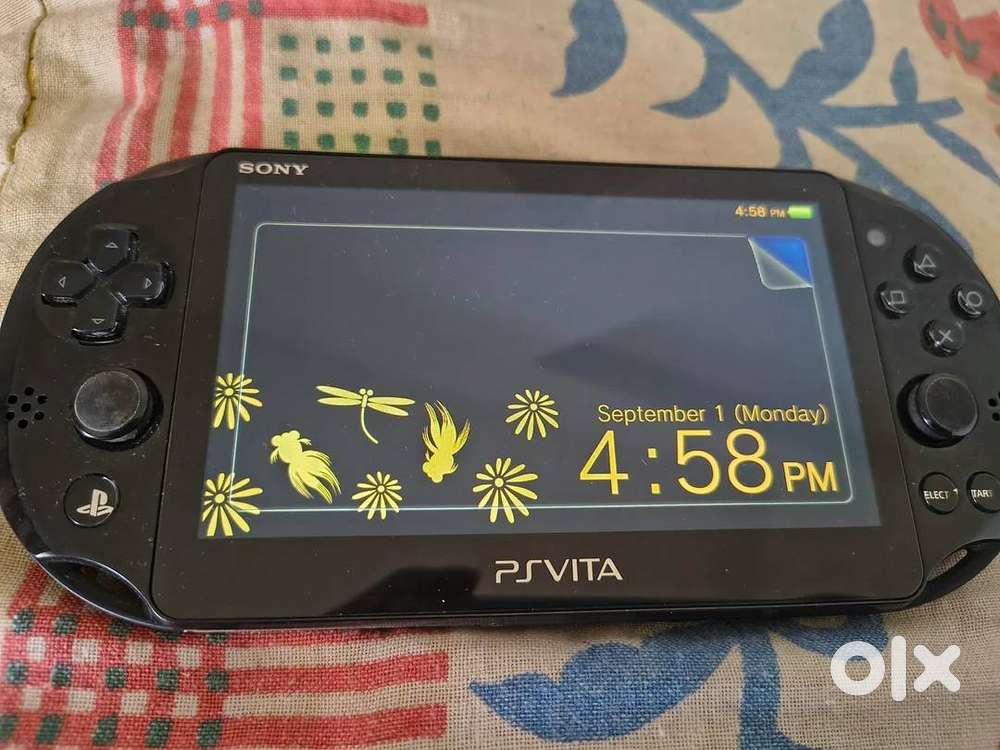 PS Vita slim with carry case and 4gb card