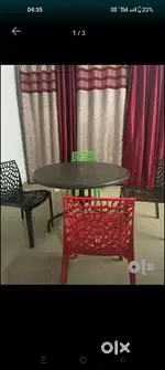 Web chair and plastic table