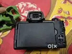 Canon M50 Mark2 with 15.45 mm lens charger with 2 battery and bag