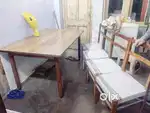 Four chairs with six seater dining table