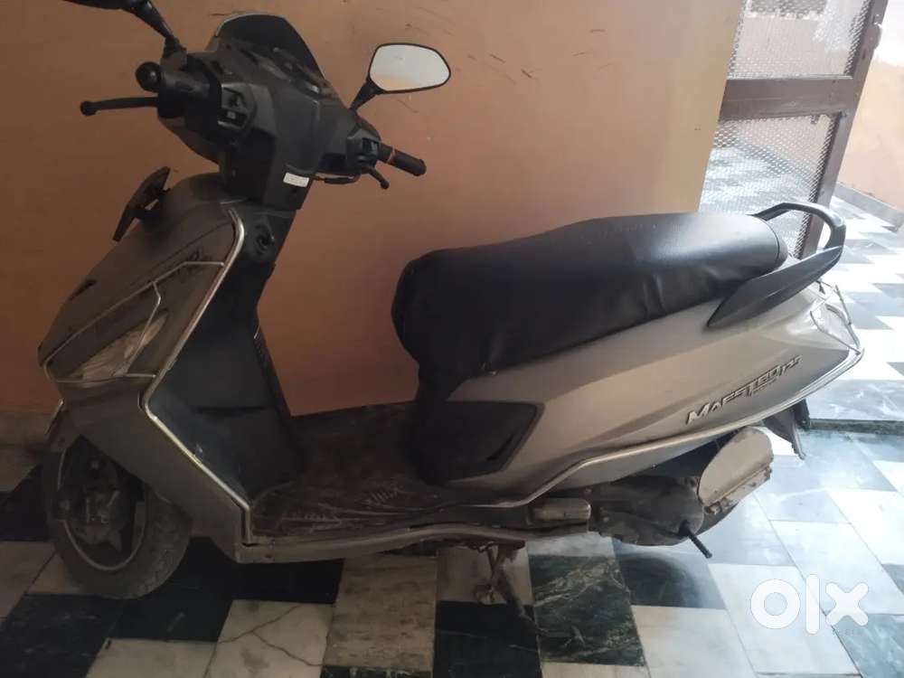 Scooty with less driven, single handed