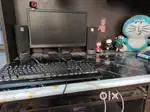 Gaming computer with keyboard and mouse, webcam and UPS