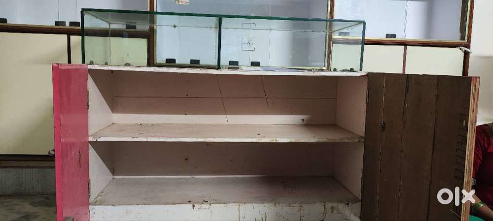 Wooden counter with top glass
