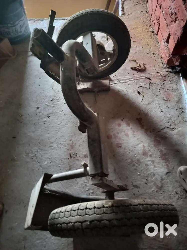Additional 2 tyres with mechanism for balancing scooty for disabled