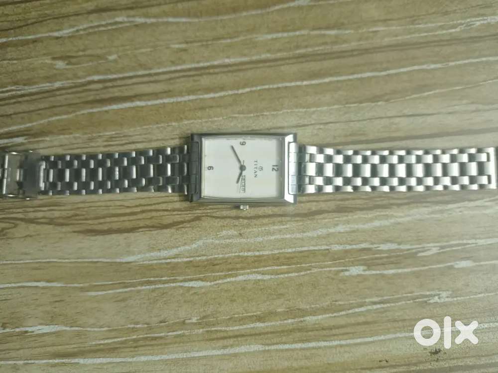 Electrolux Washing Machine And Titan Watch