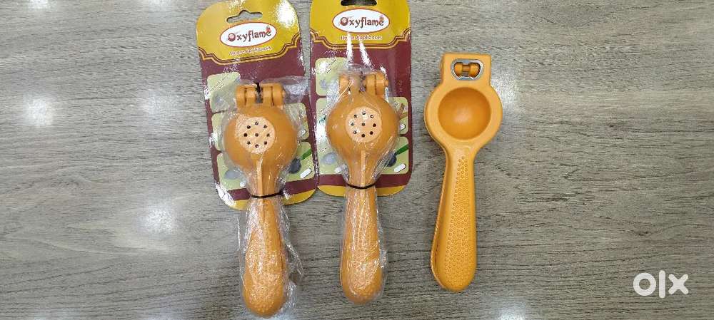Lemon squeezer with opener