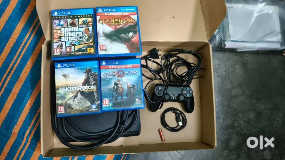Ps 4 slim 1 tb with 4 game & 1 controller
