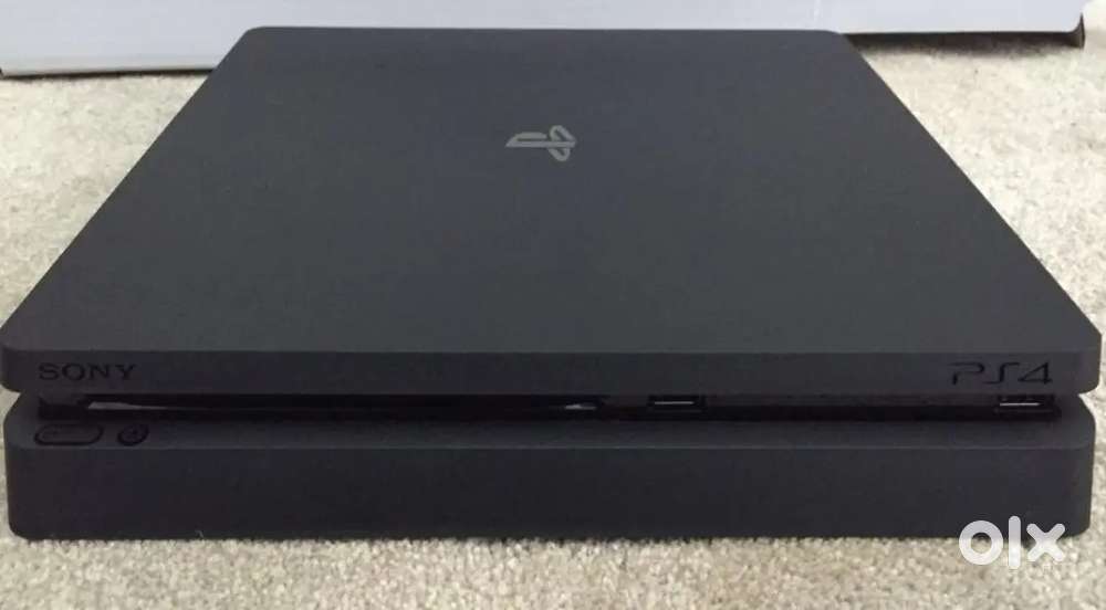 PS4 SLIM 1TB WITH 1 JOYSTICK AND ALL CONNECTING WIRES(7GAMES)