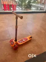 Kids scate scooter orange colour