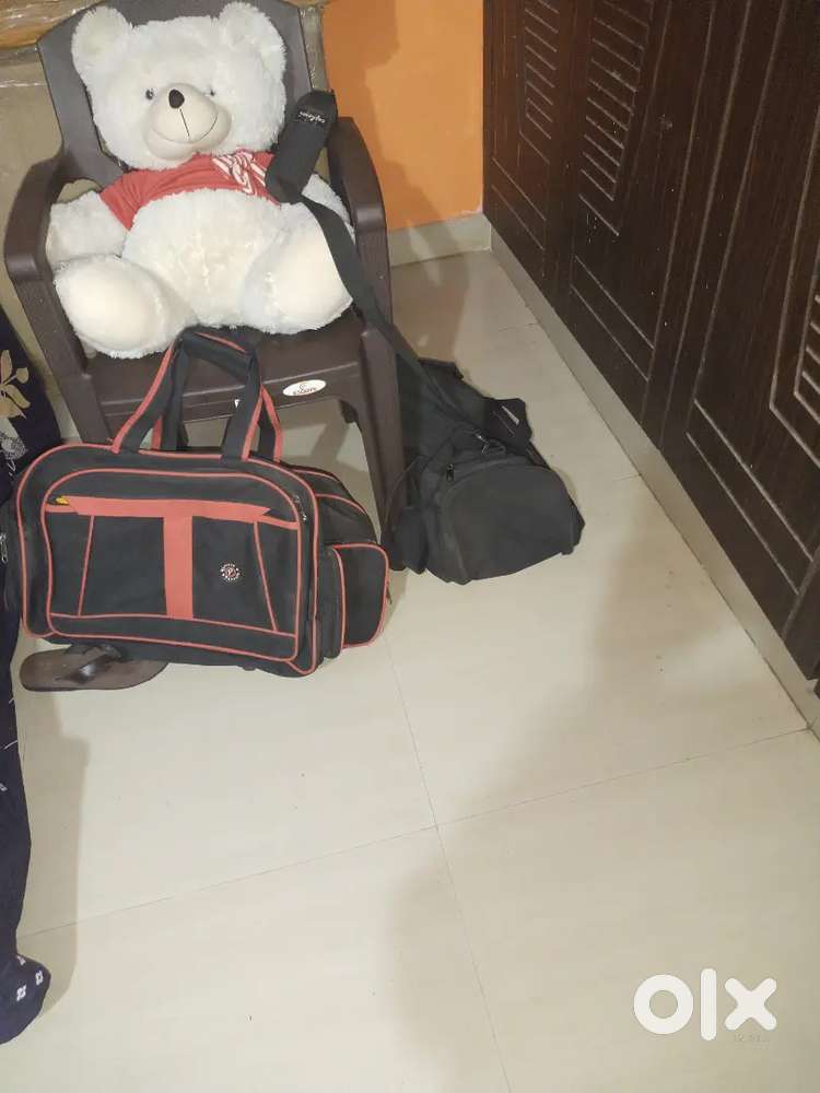 2 no. Travelling bags one soft toy, 2 plastic stool