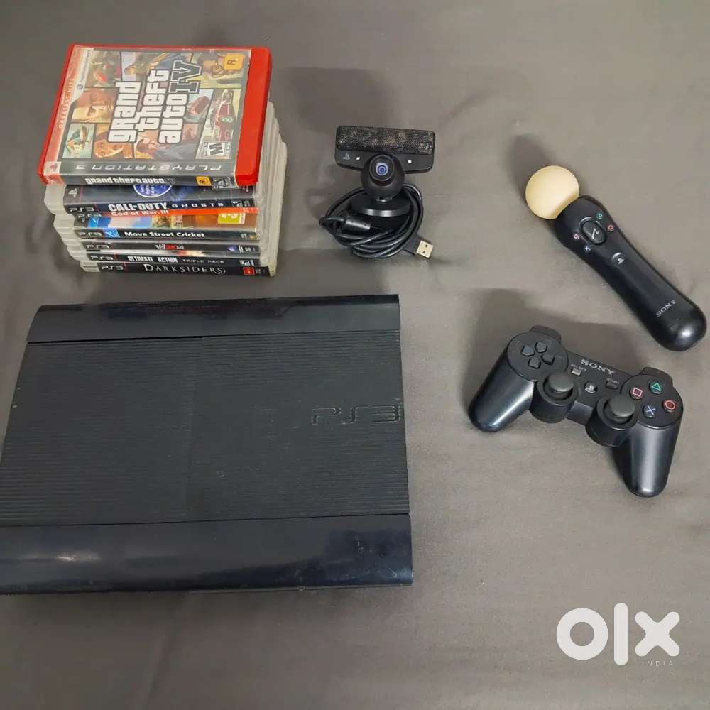 PS3 Super Slim 500GB  Controller + Move + Camera  Loaded with Games