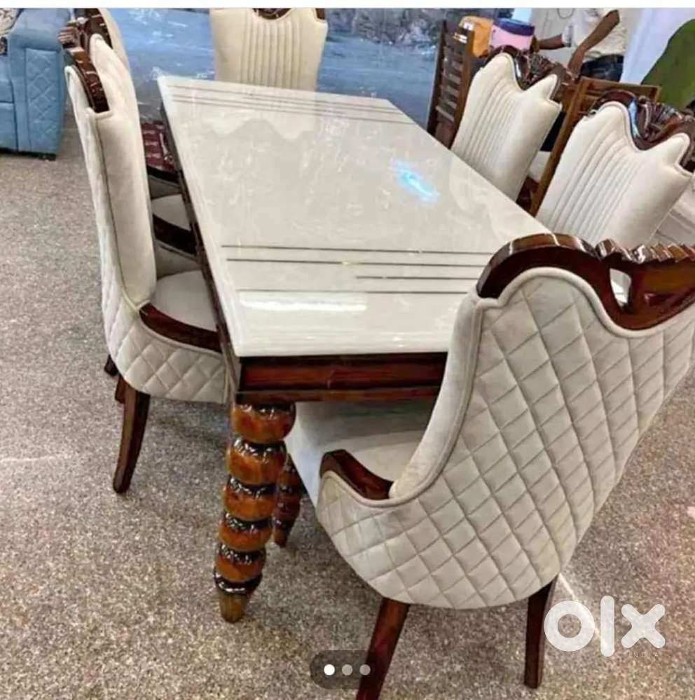 6 chair dinning table and designing chair with beautiful marble