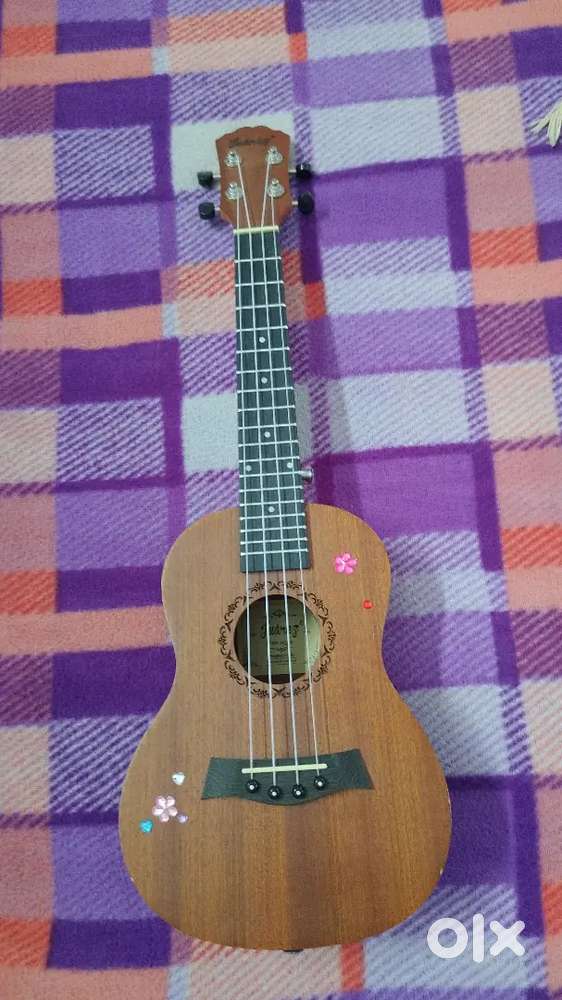 It's an ukelele only 1 month use its new