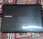 Samsung Laptop (Not Working) + Original Charger – For Parts