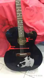 Signature desingner guitar just a month old for sale.