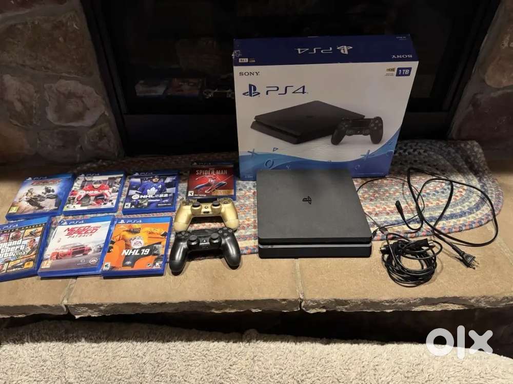 PlayStation 4 1 Tb With 2 Controllers And 7 Games With The Box