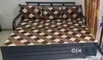 IRON SOFA CUM BED WITH STORAGE