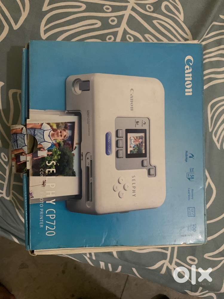 Canon selphy cp 720 photo printer brand new condition with all things