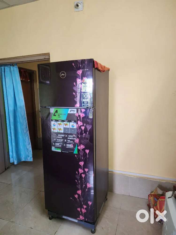 Godrej Double Door with fridge stand for sell