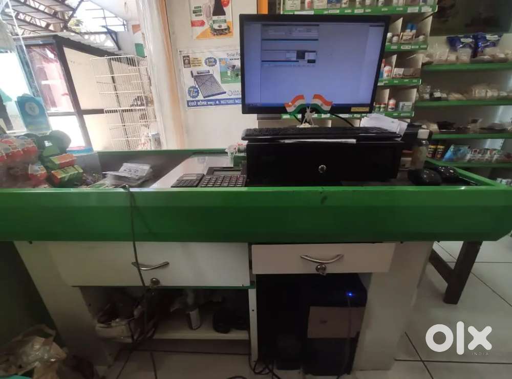 Stainless steel billing counter with 2 shelves available for sale