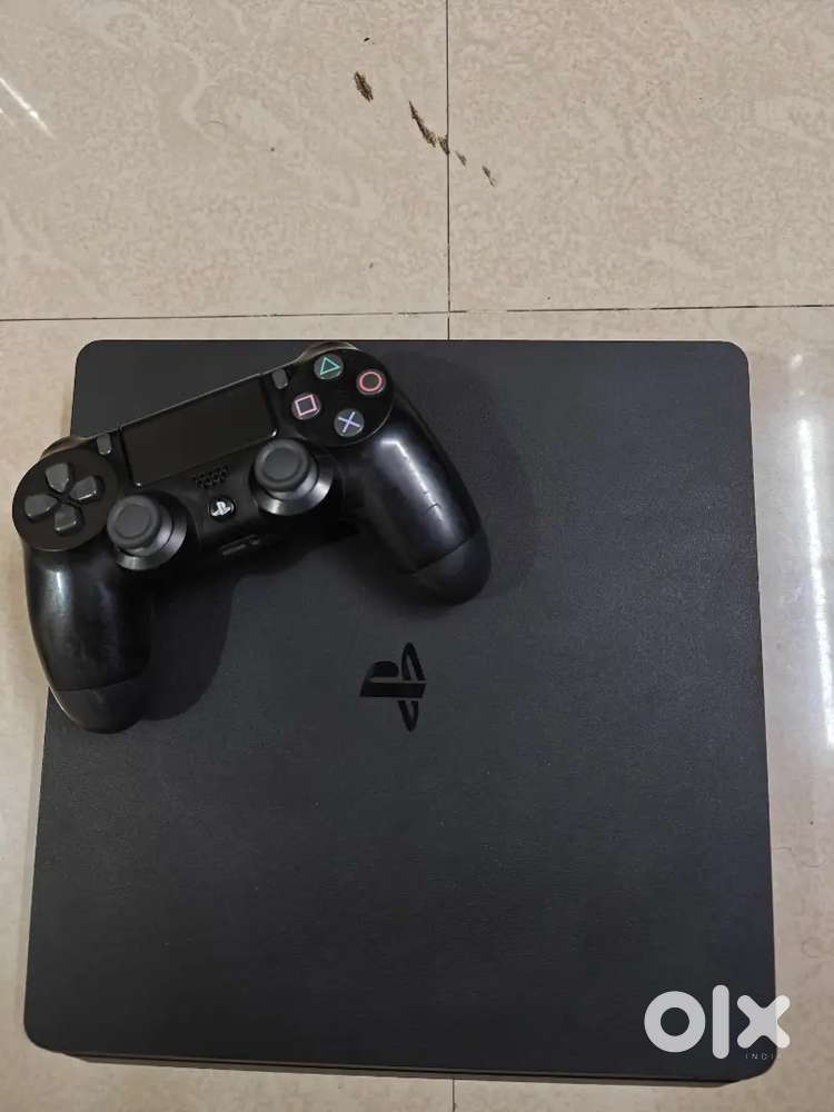 Ps 4 SLIM 1TB with box 10 games lodedd