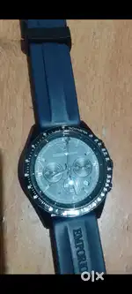 Watch brand is Emporio Armani
