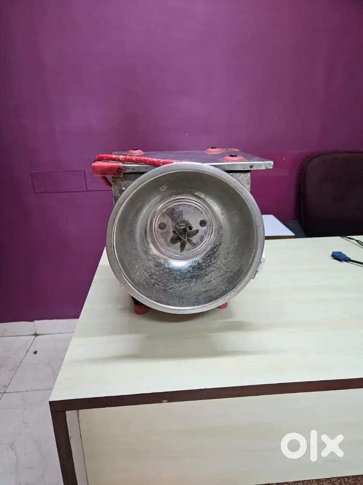 Commercial coconut scraper