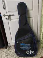 Yamaha F 310 Acoustic Guitar with free guitar bag at a reasonable rate