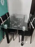 Dining table sale 4500and sofa cumbad thoda sa damage Hai sofa