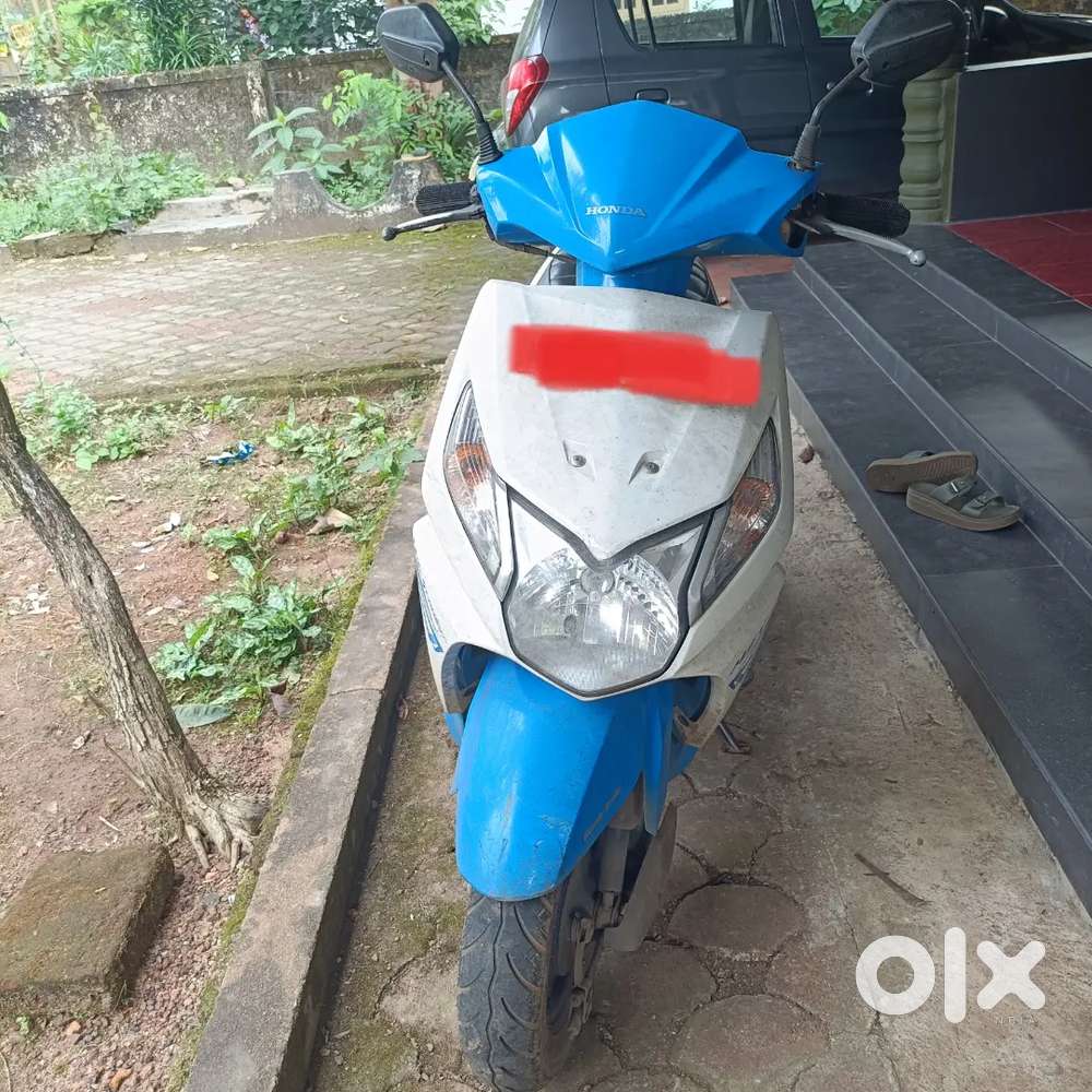 Dio 110  white and blue colour