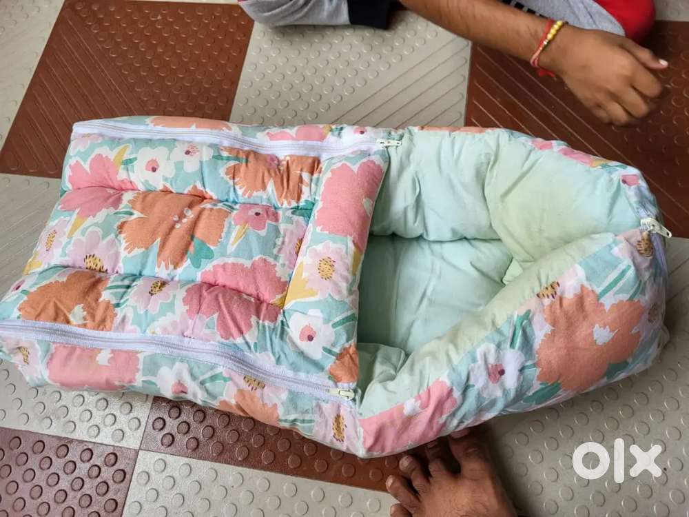 New born baby carrying nest