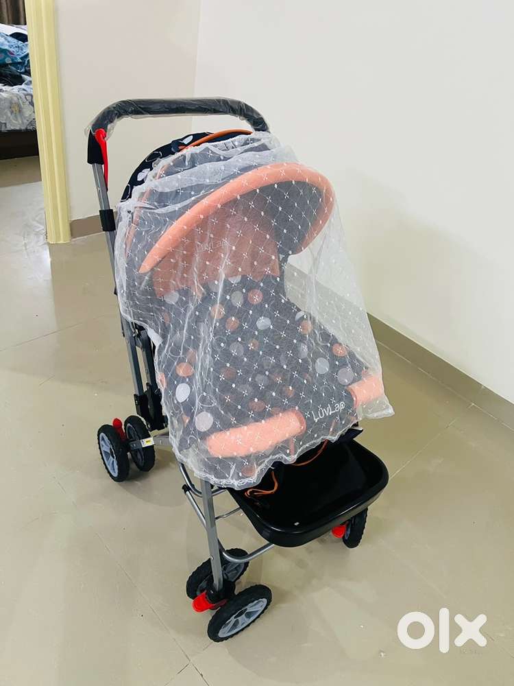 One time used Luvlap baby Stroller for sale