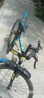new bycycle  sports edition black colour Blue and green colour sticker