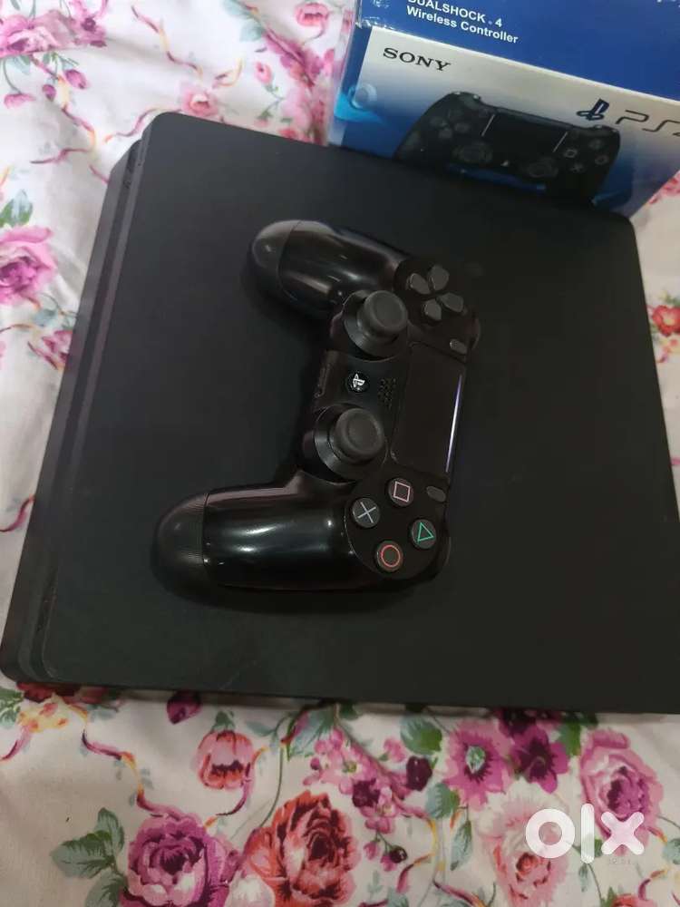 PS4 Slim 1TB excellent condition as good as new