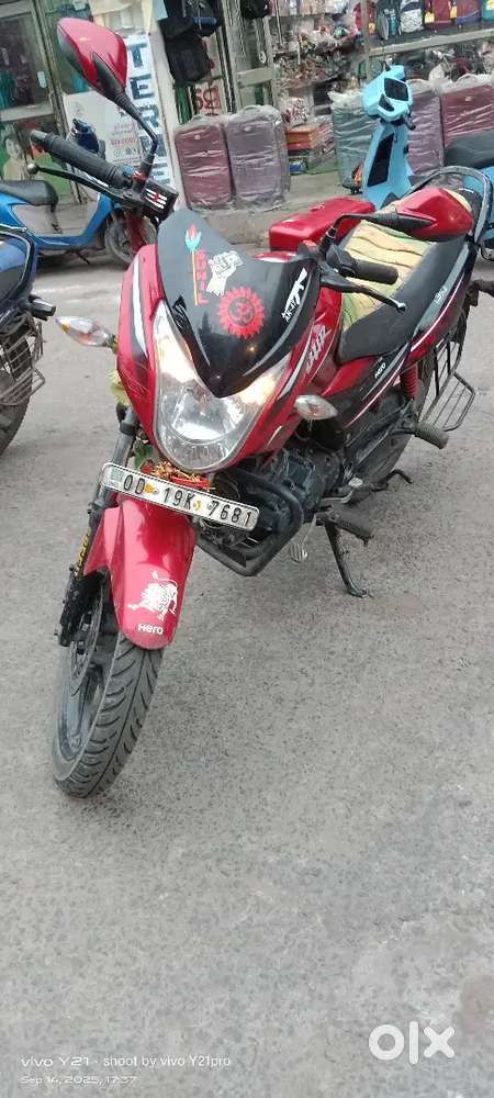 A bike of fuul stickers and petrol bike and front disk breek