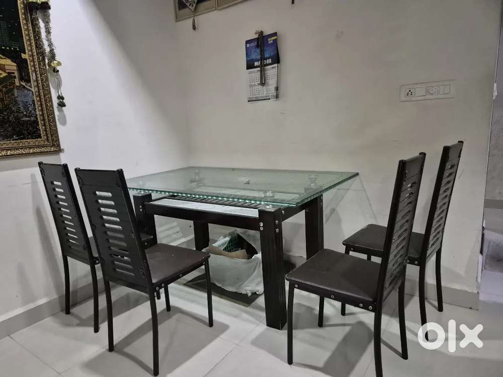 Heavy glass dining table