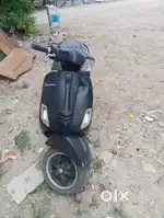 Vespa black colour scooty sxl 125 2019 may registration