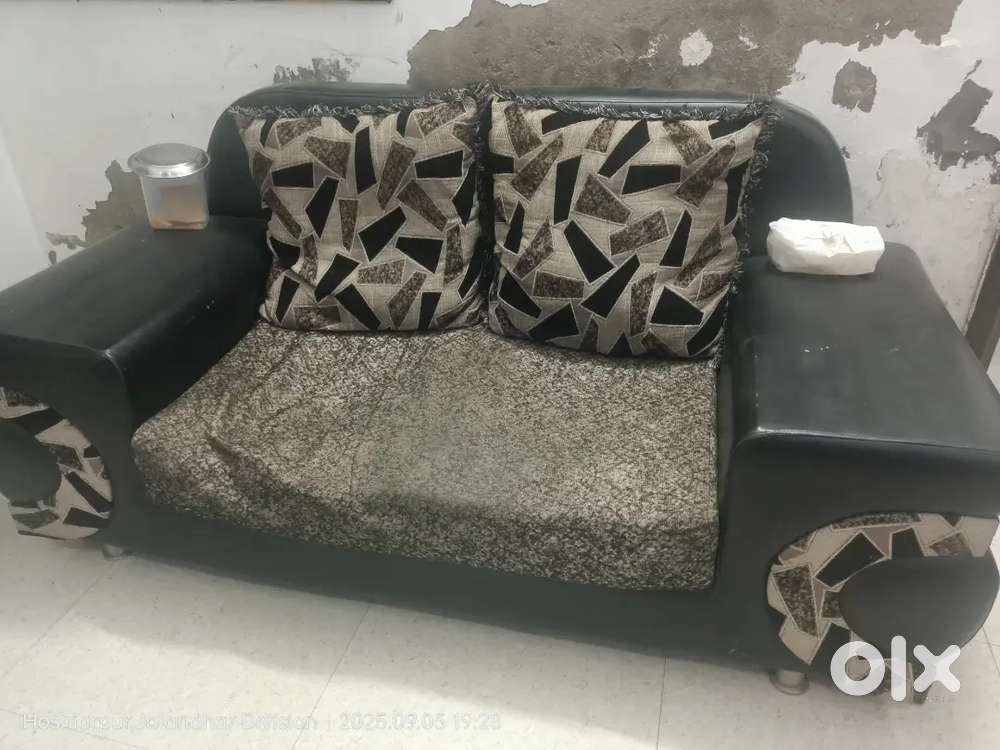 Black two seater sofa couch