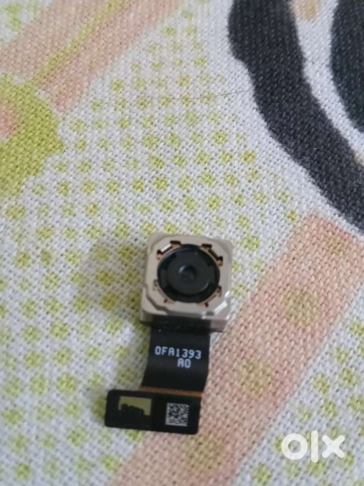 This image is a mobile phone camera module, specifically a rear camera