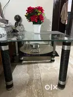Glass top coffee/center table with glass shelve