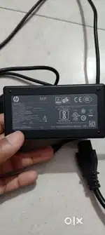 Hp charger new 65watt. 3 months old. With power cable.