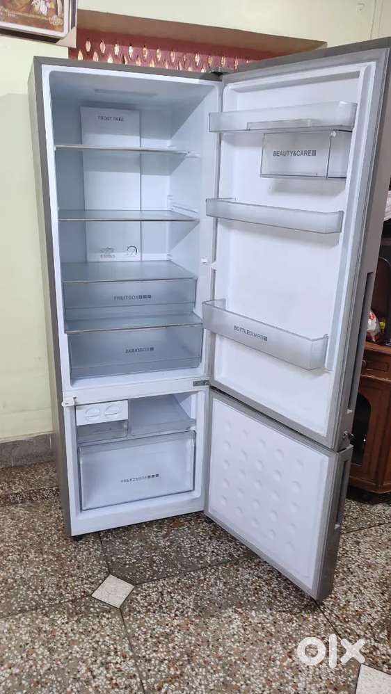 Haier rafrigrater 345 litre with front taffend glass.