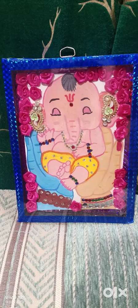 This is the very beautiful Ganesha I give you this picture with frame